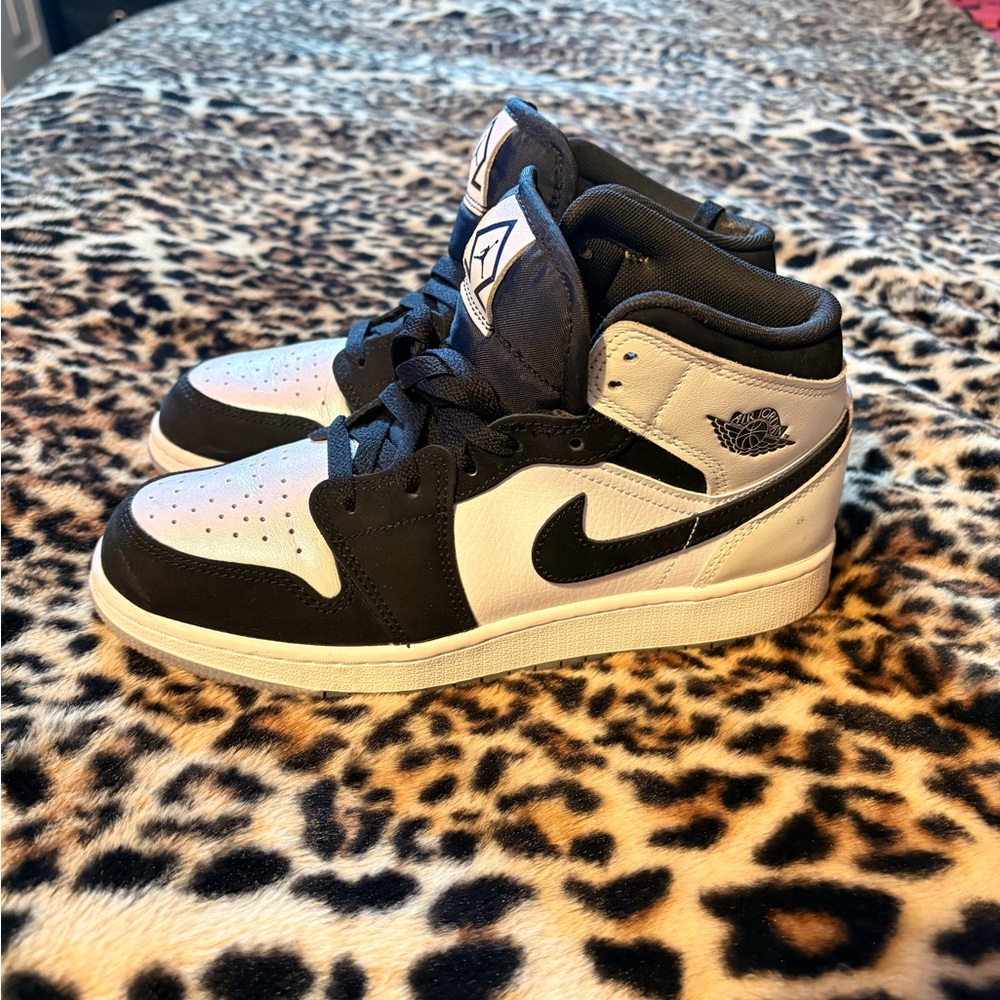 Nike Black and White Mid-Top Sneakers